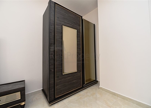 Квартира 2+1 с большой террасой в новом комплексе в Махмутларе