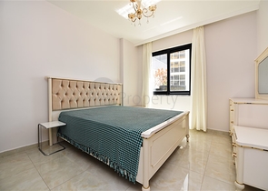 Квартира 2+1 с большой террасой в новом комплексе в Махмутларе