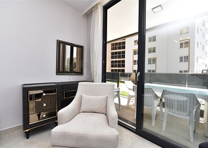 Квартира 2+1 с большой террасой в новом комплексе в Махмутларе