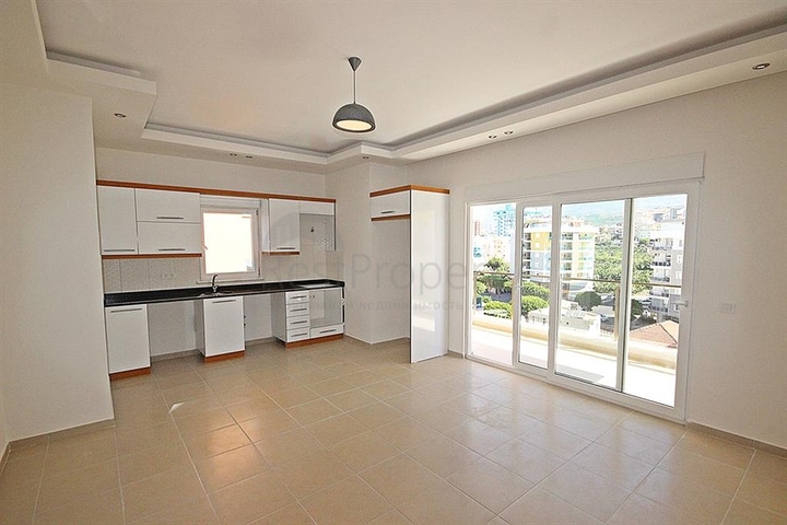 Апартаменты 2+1 рядом с морем в центре Махмутлара