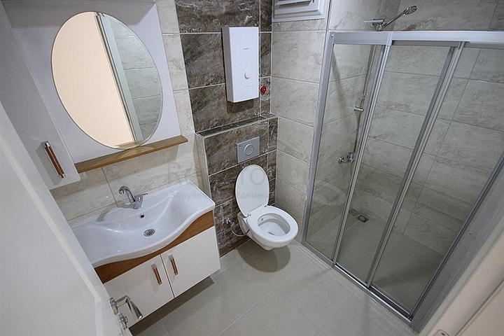 Апартаменты 2+1 рядом с морем в центре Махмутлара