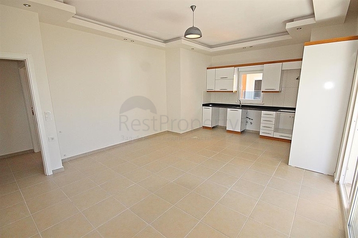 Апартаменты 2+1 рядом с морем в центре Махмутлара