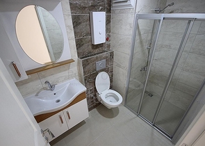 Апартаменты 2+1 рядом с морем в центре Махмутлара