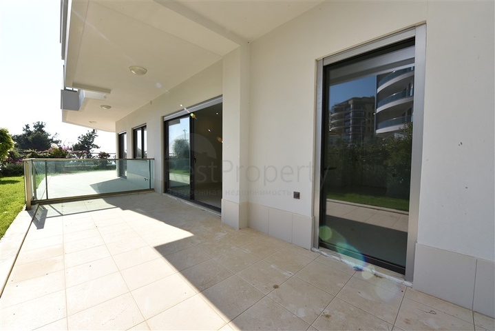 Двухуровневая квартира 2+1 с выходом в сад в Каргыджаке