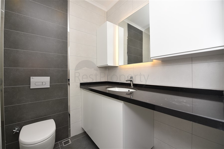 Двухуровневая квартира 2+1 с выходом в сад в Каргыджаке