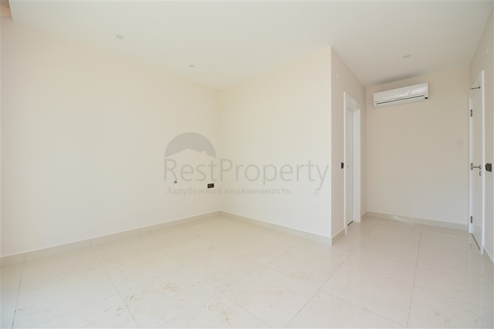 Двухуровневая квартира 2+1 с выходом в сад в Каргыджаке