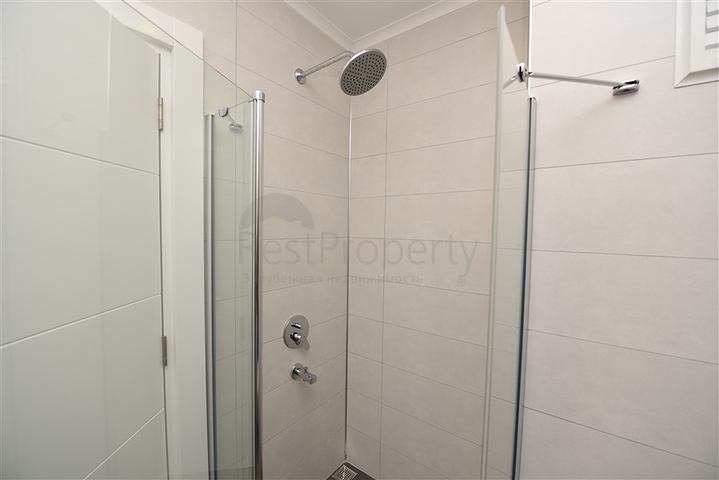 Двухуровневая квартира 2+1 с выходом в сад в Каргыджаке