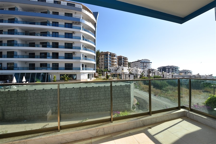 Двухуровневая квартира 2+1 с выходом в сад в Каргыджаке