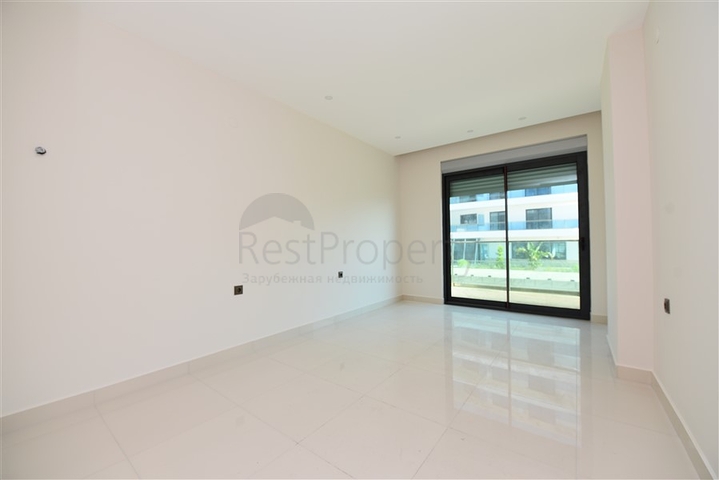 Двухуровневая квартира 2+1 с выходом в сад в Каргыджаке