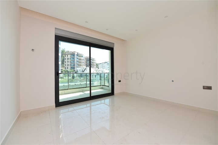 Двухуровневая квартира 2+1 с выходом в сад в Каргыджаке