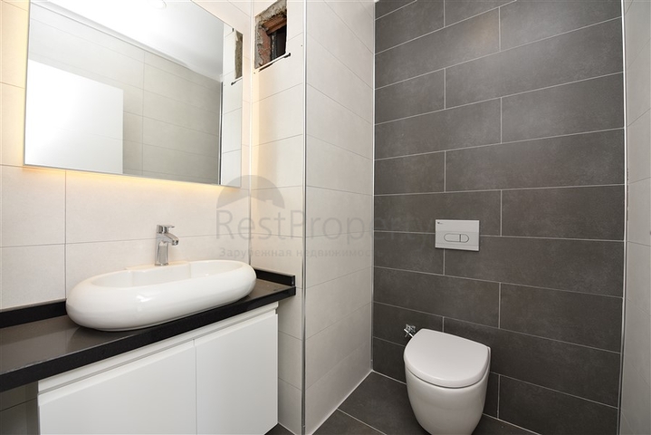 Двухуровневая квартира 2+1 с выходом в сад в Каргыджаке