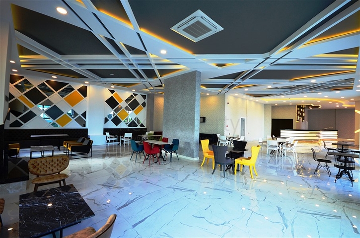 Двухуровневая квартира 2+1 с выходом в сад в Каргыджаке