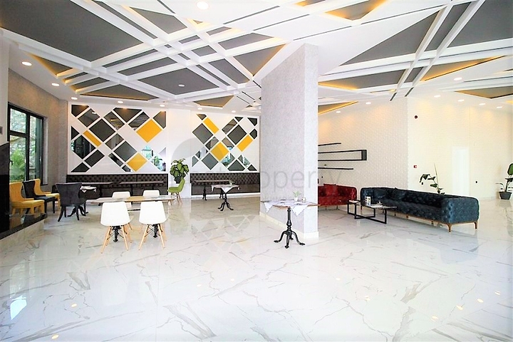 Двухуровневая квартира 2+1 с выходом в сад в Каргыджаке