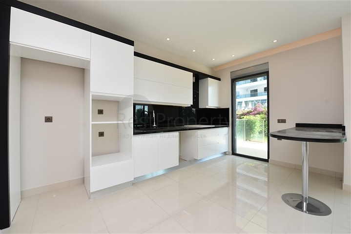 Двухуровневая квартира 2+1 с выходом в сад в Каргыджаке