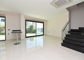 Двухуровневая квартира 2+1 с выходом в сад в Каргыджаке