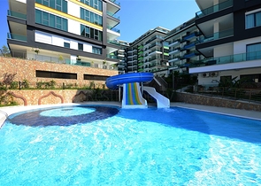 Двухуровневая квартира 2+1 с выходом в сад в Каргыджаке