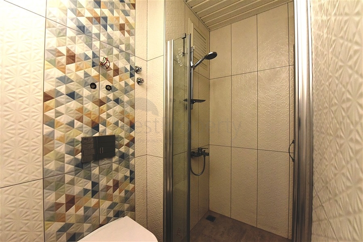 Квартира 2+1 скомплексе на берегу моря, в центре Алании