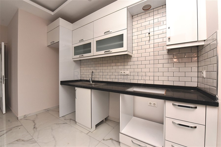 Квартира 2+1 скомплексе на берегу моря, в центре Алании