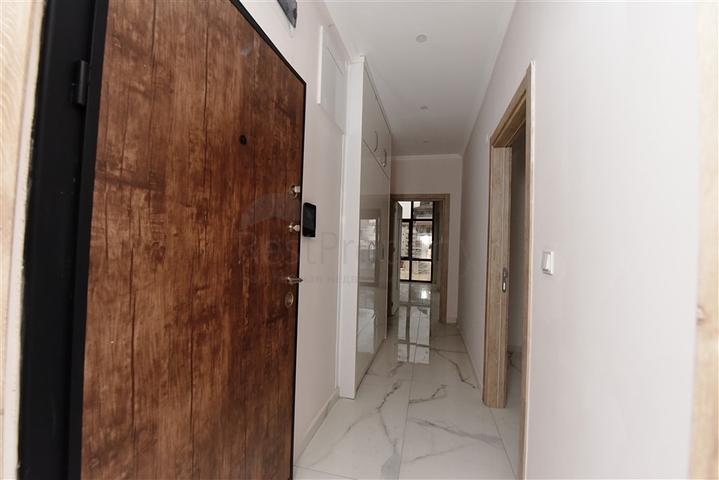 Квартира 2+1 скомплексе на берегу моря, в центре Алании