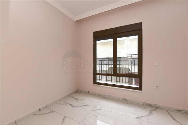 Квартира 2+1 скомплексе на берегу моря, в центре Алании