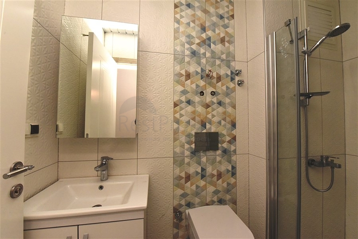 Квартира 2+1 скомплексе на берегу моря, в центре Алании