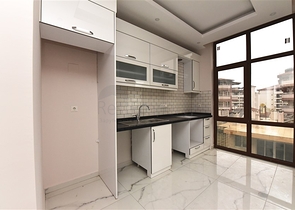 Квартира 2+1 скомплексе на берегу моря, в центре Алании