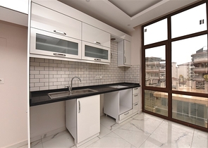 Квартира 2+1 скомплексе на берегу моря, в центре Алании