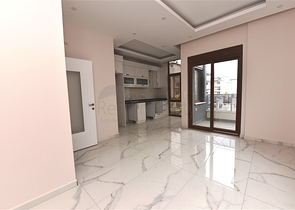 Квартира 2+1 скомплексе на берегу моря, в центре Алании