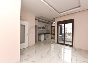 Квартира 2+1 скомплексе на берегу моря, в центре Алании