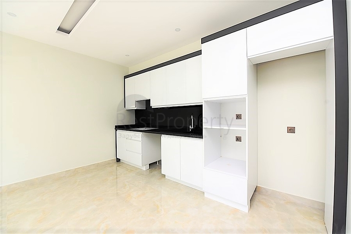 Апартаменты 2+1 на первой береговой линии в Махмутларе