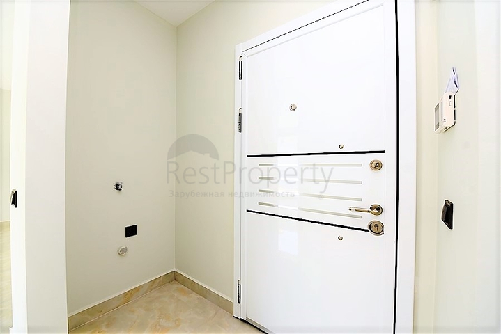 Апартаменты 2+1 на первой береговой линии в Махмутларе