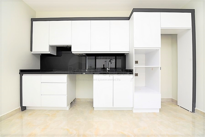 Апартаменты 2+1 на первой береговой линии в Махмутларе