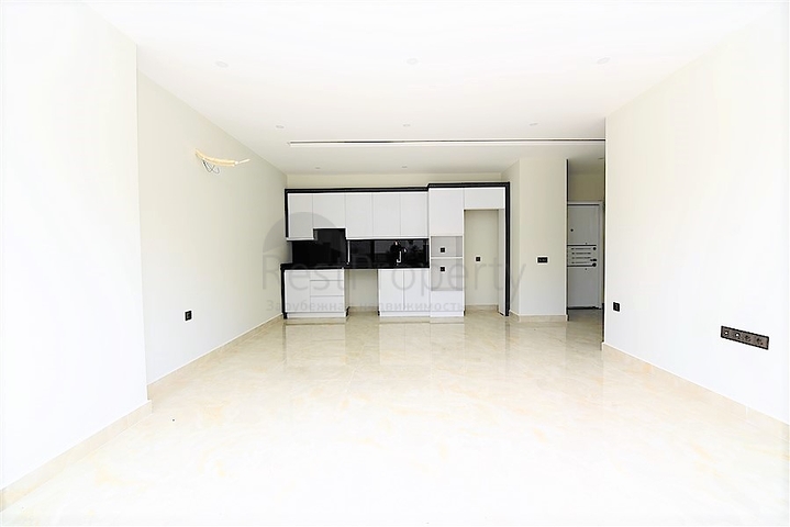 Апартаменты 2+1 на первой береговой линии в Махмутларе