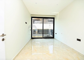 Апартаменты 2+1 на первой береговой линии в Махмутларе