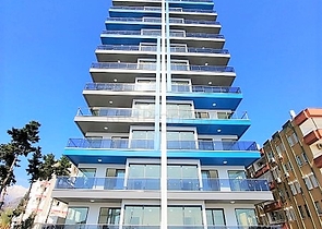 Апартаменты 2+1 на первой береговой линии в Махмутларе