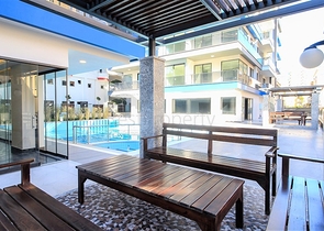 Апартаменты 2+1 на первой береговой линии в Махмутларе