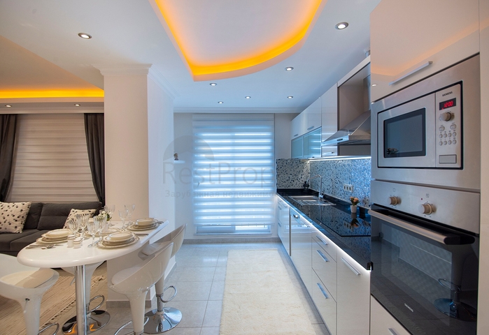 Меблированные апартаменты в районе Махмутлар