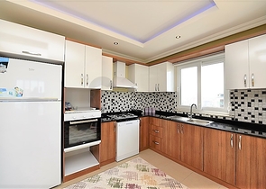 Пентхаус с четырьмя спальнями в Махмутлар