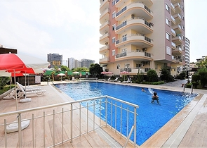 Пентхаус с четырьмя спальнями в Махмутлар