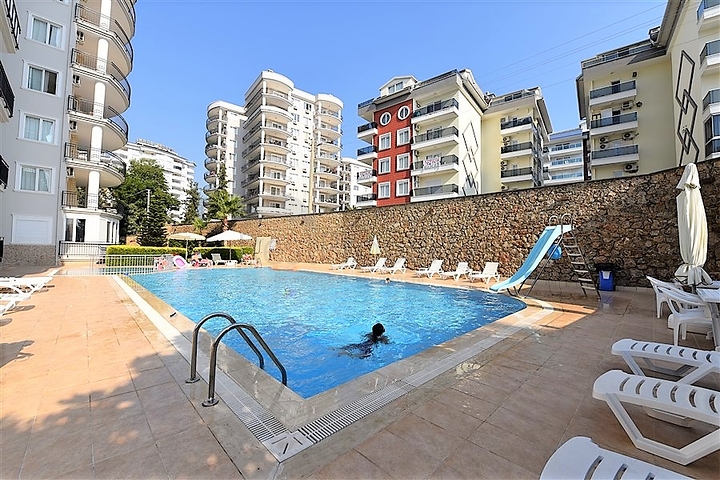 Просторные трехкомнатные апартаменты в районе Аланьи Тосмур