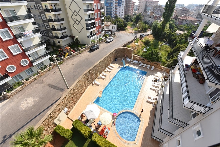 Просторные трехкомнатные апартаменты в районе Аланьи Тосмур