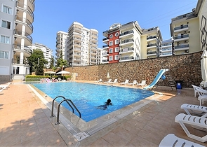 Просторные трехкомнатные апартаменты в районе Аланьи Тосмур