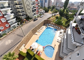 Просторные трехкомнатные апартаменты в районе Аланьи Тосмур