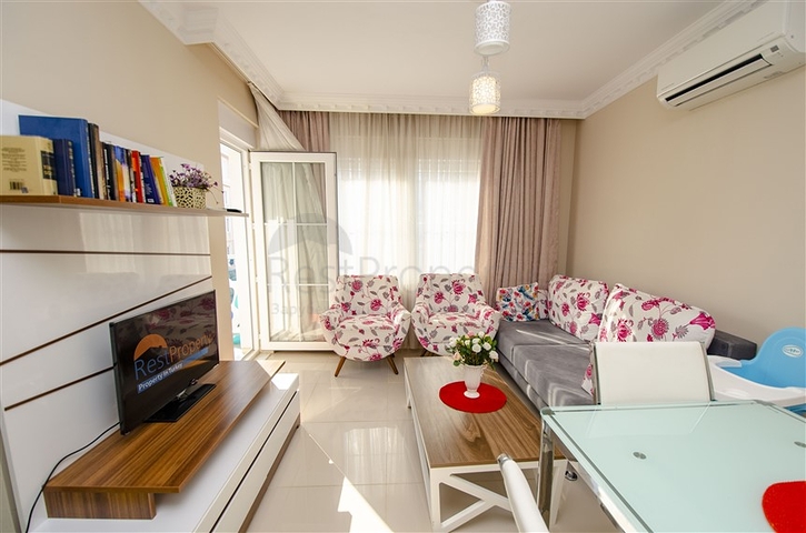 Квартира 2+1 с мебелью с видом на бассейн в Анталии