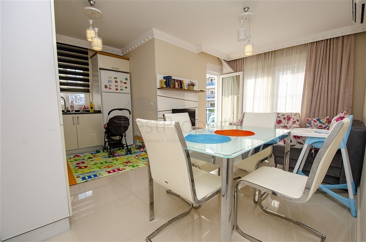 Квартира 2+1 с мебелью с видом на бассейн в Анталии