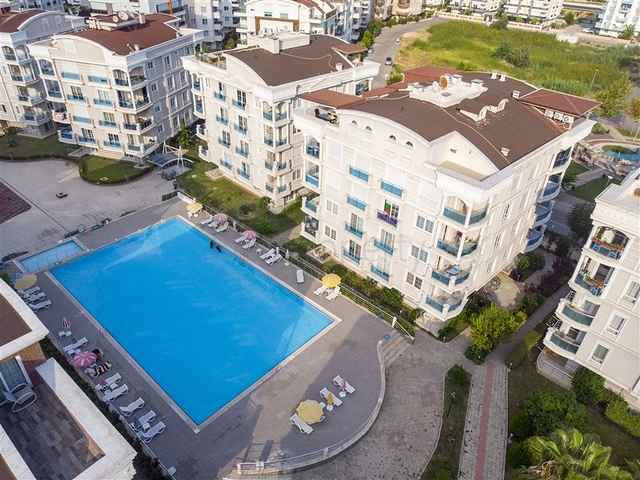 Квартира 2+1 с мебелью с видом на бассейн в Анталии