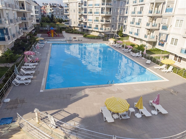 Квартира 2+1 с мебелью с видом на бассейн в Анталии