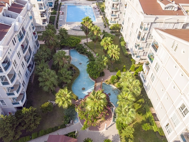 Квартира 2+1 с мебелью с видом на бассейн в Анталии