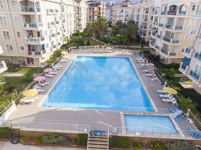 Квартира 2+1 с мебелью с видом на бассейн в Анталии