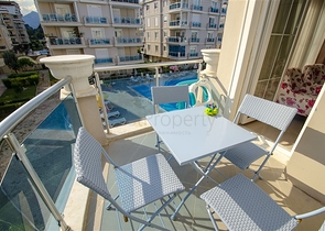 Квартира 2+1 с мебелью с видом на бассейн в Анталии